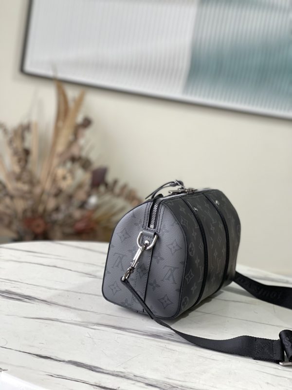 Louis Vuitton Keepall Travel Urban Handbag - Image 5